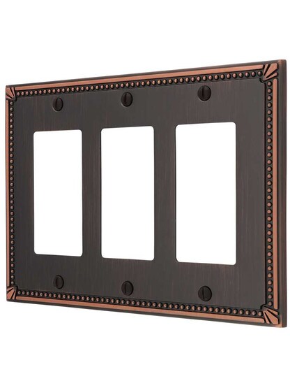 Imperial Bead Triple GFI Cover Plate in Aged Bronze.
